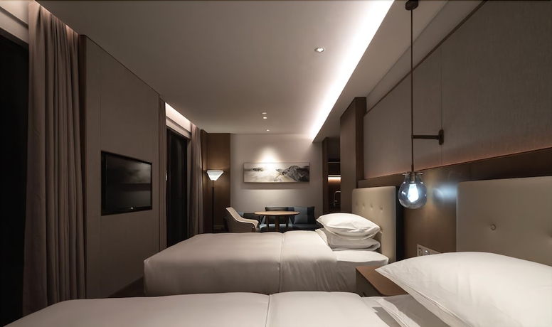 Imagen de la habitación del Hotel Wingate by Wyndham Hainan Chengmai. Foto 7