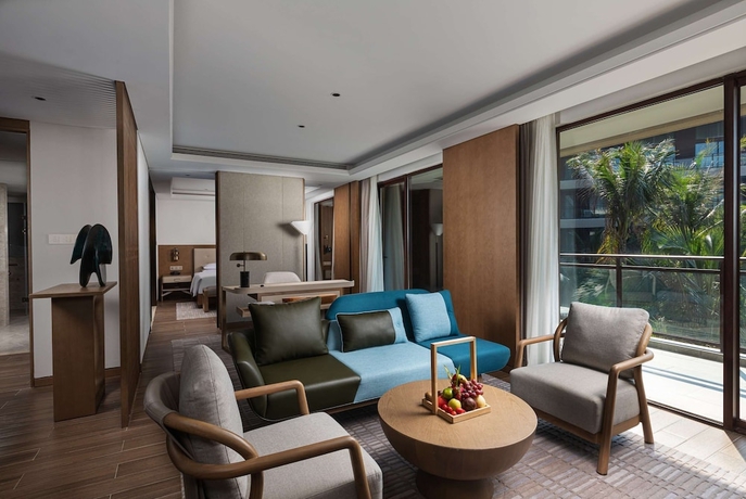 Imagen de la habitación del Hotel Wingate by Wyndham Hainan Chengmai. Foto 11