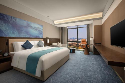 Imagen de la habitación del Hotel Wingate by Wyndham Kunming Airport. Foto 6