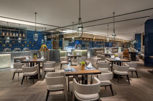 Imagen del bar/restaurante del Hotel Wingate by Wyndham Kunming Airport. Foto 3