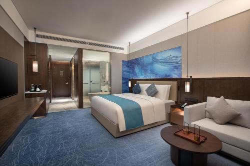 Imagen de la habitación del Hotel Wingate by Wyndham Kunming Airport. Foto 7