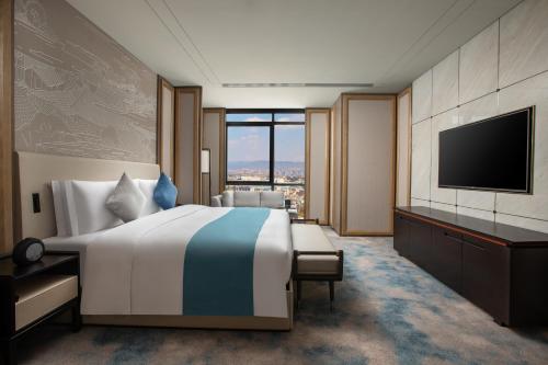 Imagen de la habitación del Hotel Wingate by Wyndham Kunming Airport. Foto 9
