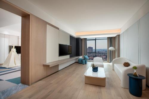 Imagen de la habitación del Hotel Wingate by Wyndham Kunming Airport. Foto 10