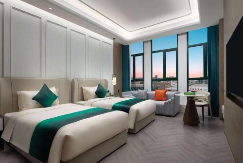 Imagen de la habitación del Hotel Wingate by Wyndham Urumqi Railway Station. Foto 11