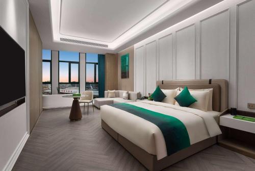 Imagen de la habitación del Hotel Wingate by Wyndham Urumqi Railway Station. Foto 14