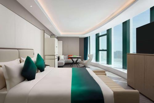 Imagen de la habitación del Hotel Wingate by Wyndham Urumqi Railway Station. Foto 16