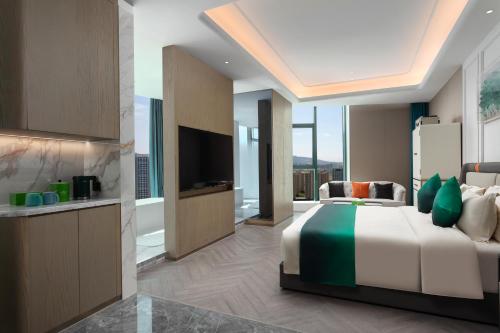 Imagen de la habitación del Hotel Wingate by Wyndham Urumqi Railway Station. Foto 17