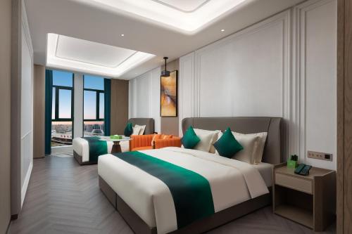 Imagen de la habitación del Hotel Wingate by Wyndham Urumqi Railway Station. Foto 20