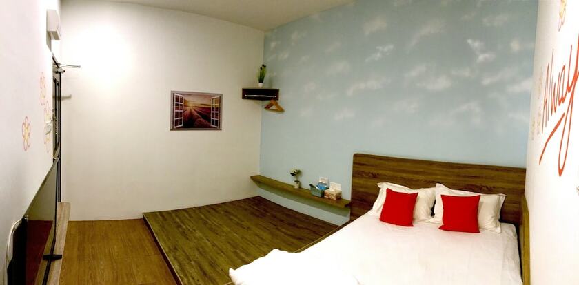 Imagen de la habitación del Hotel Winggarden Murals House. Foto 13