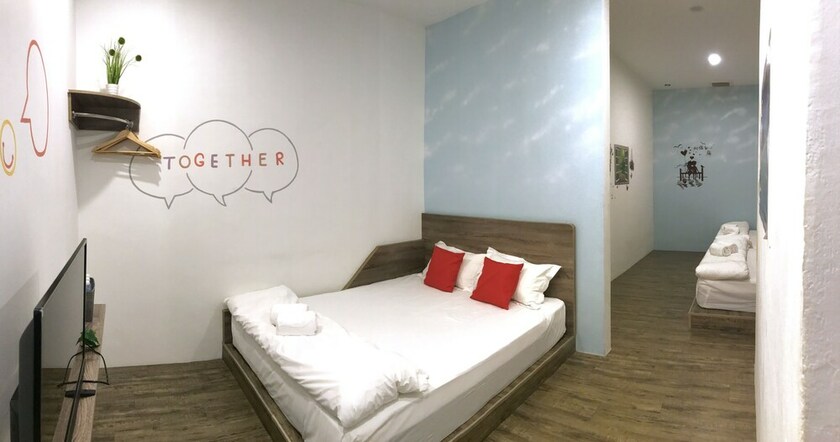 Imagen de la habitación del Hotel Winggarden Murals House. Foto 19