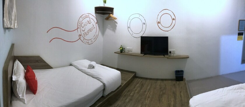 Imagen de la habitación del Hotel Winggarden Murals House. Foto 28