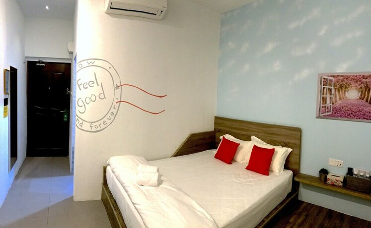 Imagen de la habitación del Hotel Winggarden Murals House. Foto 37