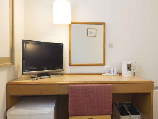 Imagen de la habitación del Hotel Wingport. Foto 8