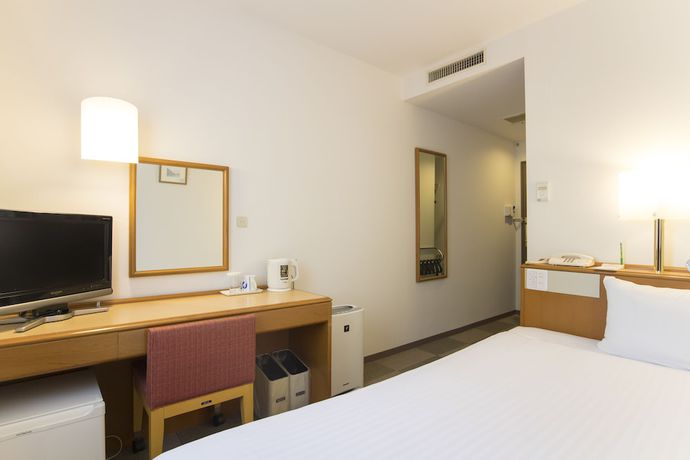 Imagen de la habitación del Hotel Wingport. Foto 11