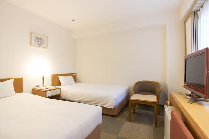 Imagen de la habitación del Hotel Wingport. Foto 13