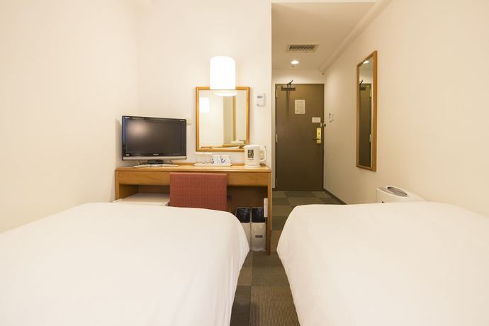 Imagen de la habitación del Hotel Wingport. Foto 16