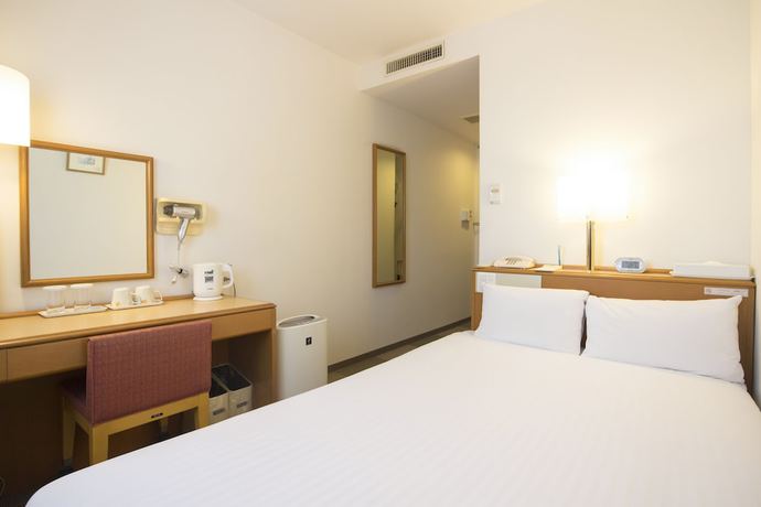 Imagen de la habitación del Hotel Wingport. Foto 17