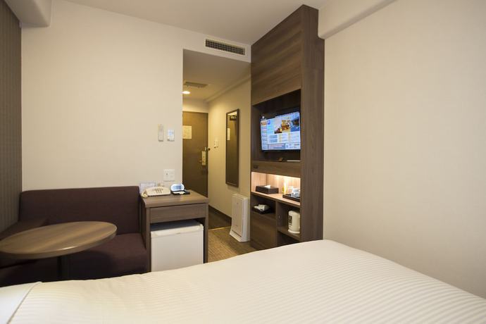 Imagen de la habitación del Hotel Wingport. Foto 18