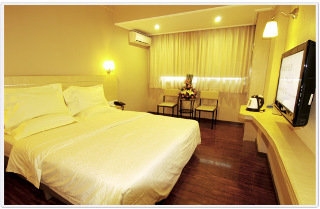 Imagen de la habitación del Hotel Wings, Guangzhou. Foto 6
