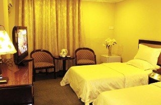 Imagen de la habitación del Hotel Wings, Guangzhou. Foto 7