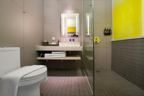 Imagen de la habitación del Hotel Wink Can Tho - 24hrs stay & Rooftop Pool Bar. Foto 12