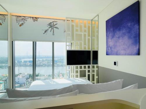 Imagen de la habitación del Hotel Wink Can Tho - 24hrs stay & Rooftop Pool Bar. Foto 13