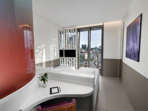 Imagen de la habitación del Hotel Wink Can Tho - 24hrs stay & Rooftop Pool Bar. Foto 14