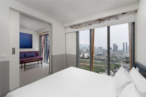 Imagen de la habitación del Hotel Wink Can Tho - 24hrs stay & Rooftop Pool Bar. Foto 16