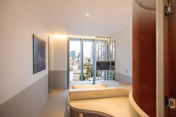 Imagen de la habitación del Hotel Wink Danang Riverside. Foto 7