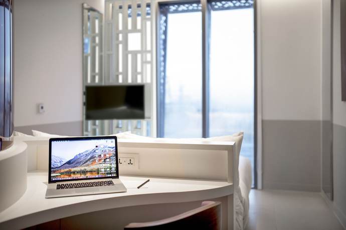 Imagen de la habitación del Hotel Wink Danang Riverside. Foto 12