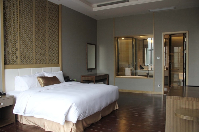 Imagen de la habitación del Hotel Winlong International. Foto 13