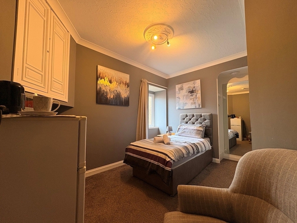 Imagen de la habitación del Hotel Winmar Guesthouse. Foto 4