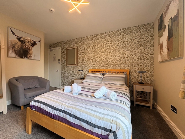 Imagen de la habitación del Hotel Winmar Guesthouse. Foto 6