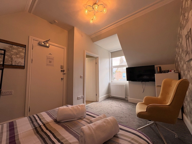 Imagen de la habitación del Hotel Winmar Guesthouse. Foto 8