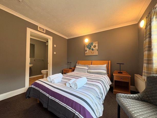 Imagen de la habitación del Hotel Winmar Guesthouse. Foto 13
