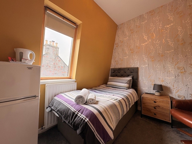 Imagen de la habitación del Hotel Winmar Guesthouse. Foto 14