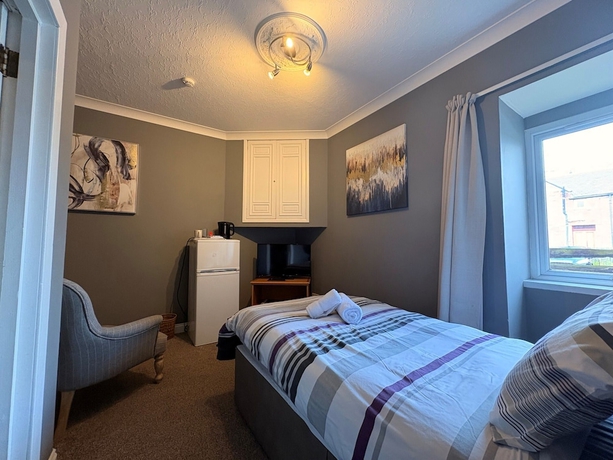 Imagen de la habitación del Hotel Winmar Guesthouse. Foto 16
