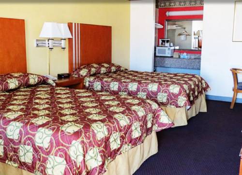 Imagen de la habitación del Hotel Winnie Inn and Suites. Foto 9