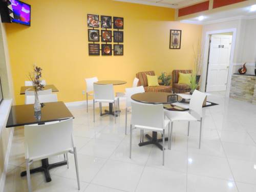 Imagen de la habitación del Hotel Winnie Inn and Suites. Foto 10