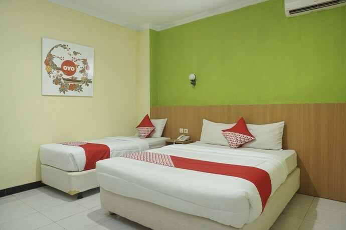 Imagen de la habitación del Hotel Winotosastro Garden. Foto 9