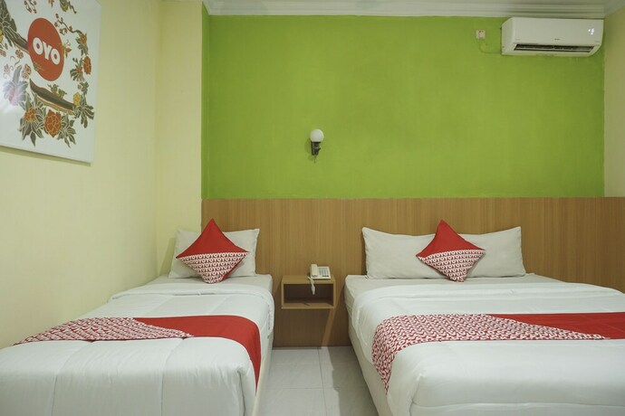 Imagen de la habitación del Hotel Winotosastro Garden. Foto 10