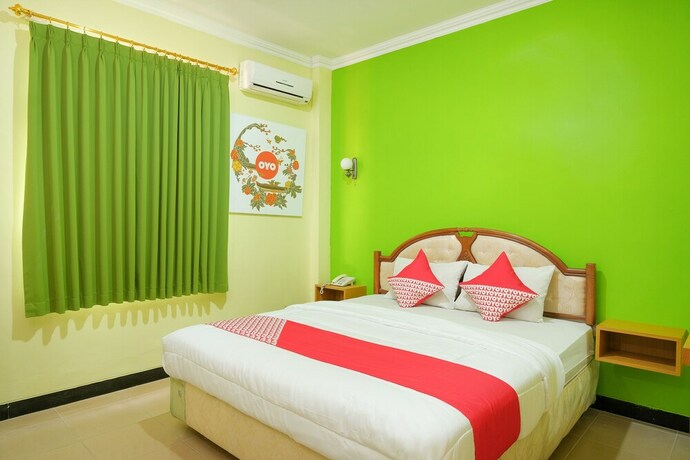Imagen de la habitación del Hotel Winotosastro Garden. Foto 11