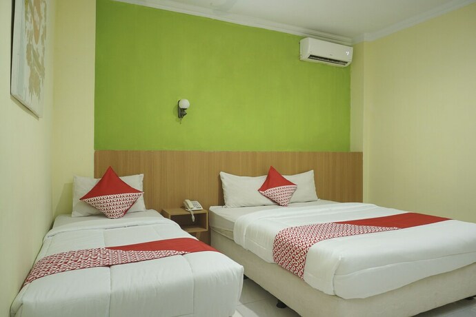 Imagen de la habitación del Hotel Winotosastro Garden. Foto 13