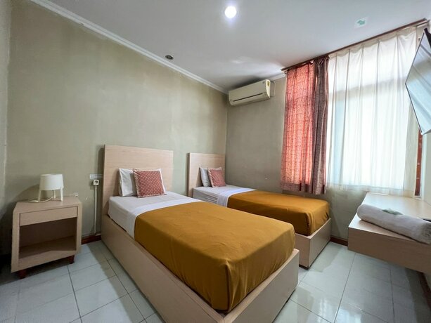 Imagen de la habitación del Hotel Winotosastro by Athelu. Foto 7