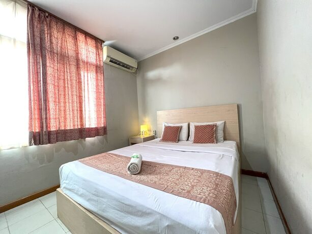 Imagen de la habitación del Hotel Winotosastro by Athelu. Foto 8