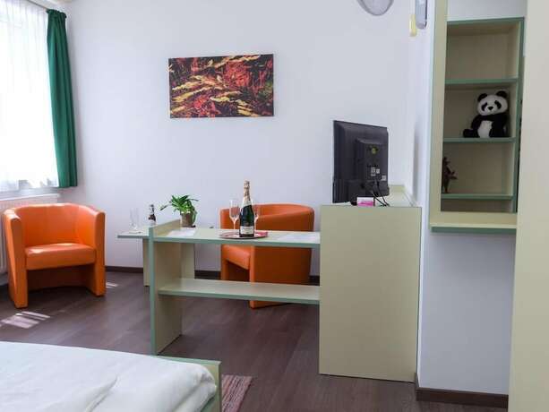 Imagen de la habitación del Hotel Winrooms. Foto 11