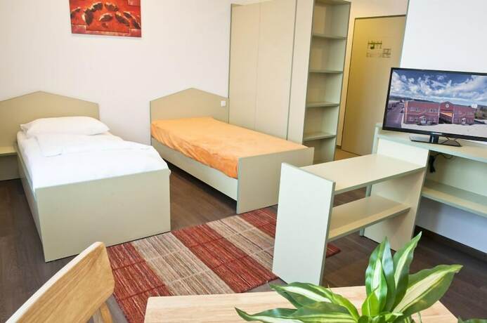 Imagen de la habitación del Hotel Winrooms. Foto 14