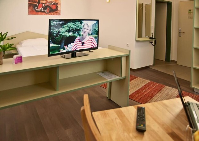 Imagen de la habitación del Hotel Winrooms. Foto 19