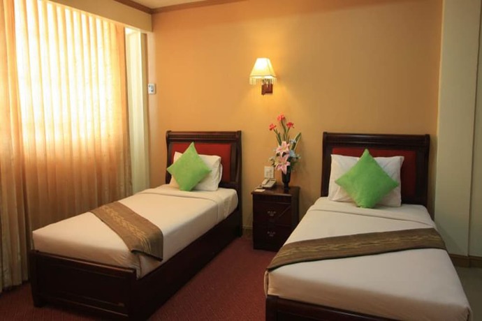 Imagen de la habitación del Hotel Winstar. Foto 7