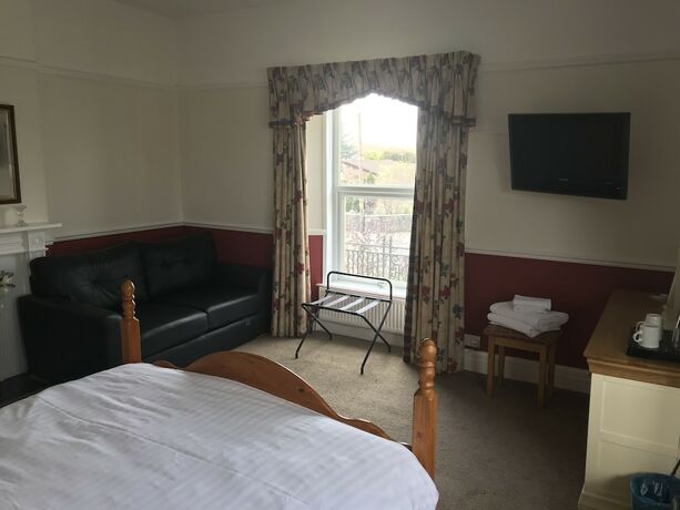 Imagen de la habitación del Hotel Winston Manor. Foto 16